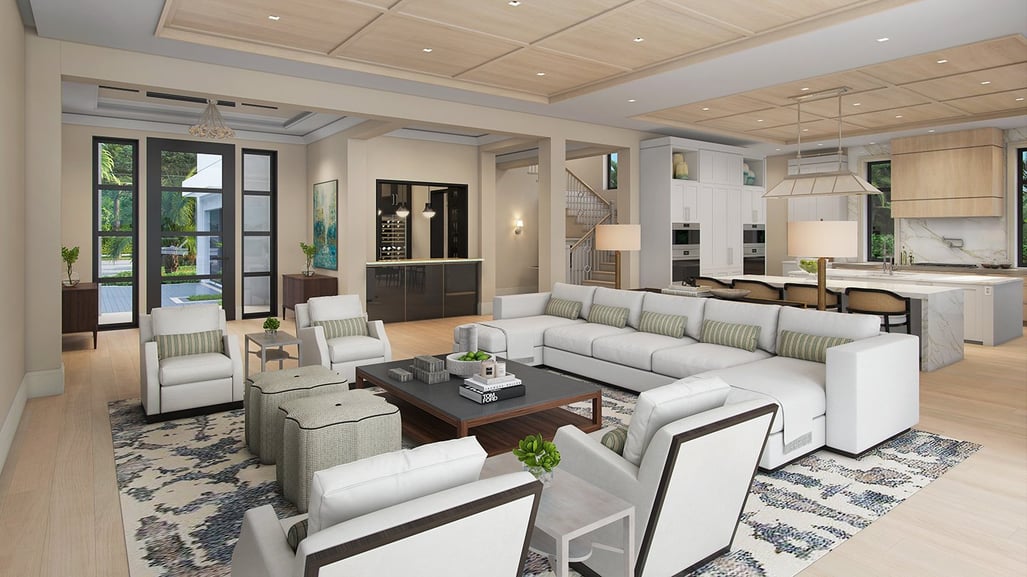 large living room with a white couch, lounge chairs, a brown coffee table and stairs in the background
