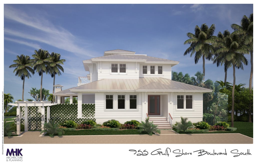coastal two story white house with palm trees on each side