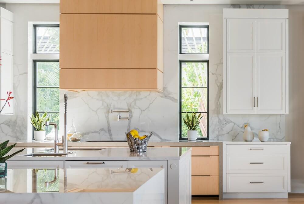 luxury kitchen with brown and white accent cabinets